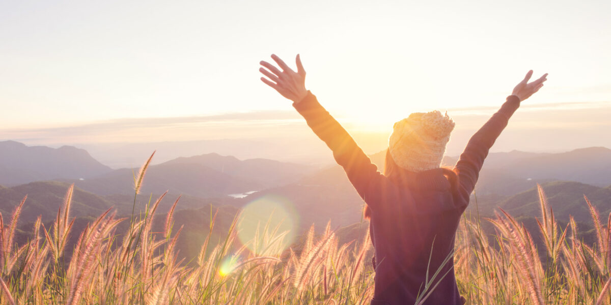 Happy Freedom in sunrise nature