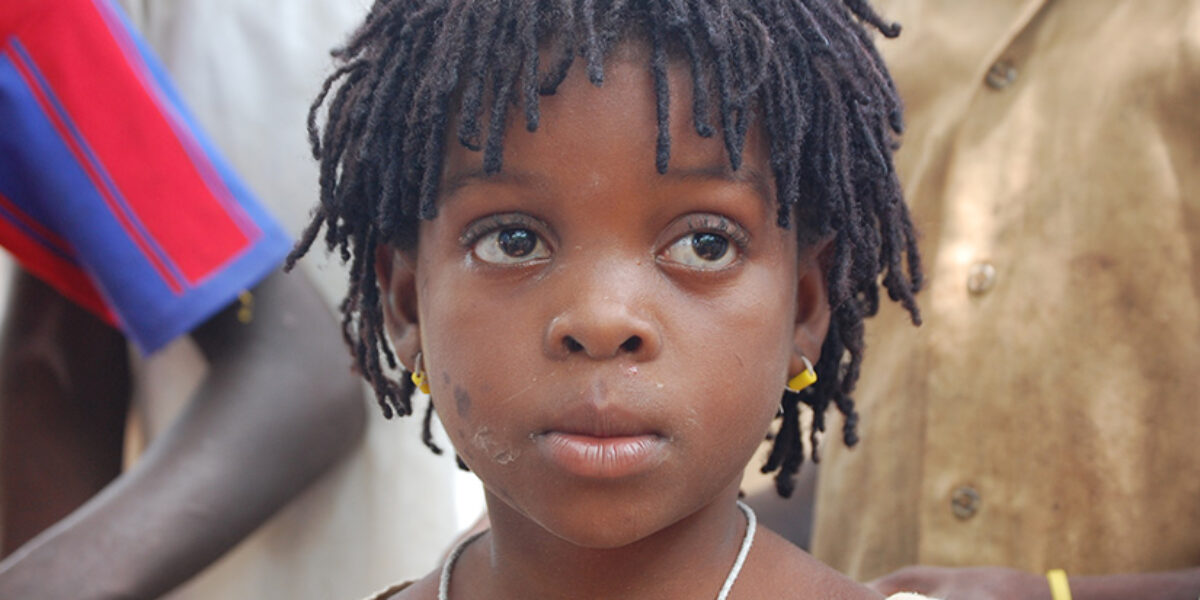 The gift of a Bible, made possible by American Bible Society’s generous financial partners, equipped Aholou (above) to engage with God’s Word through illustrated stories and coloring pages.