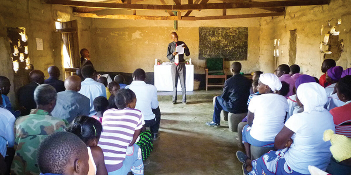 A village church listens to New Testament readings in their native tongue of Nsenga. Photo credit: Chris Pluger.