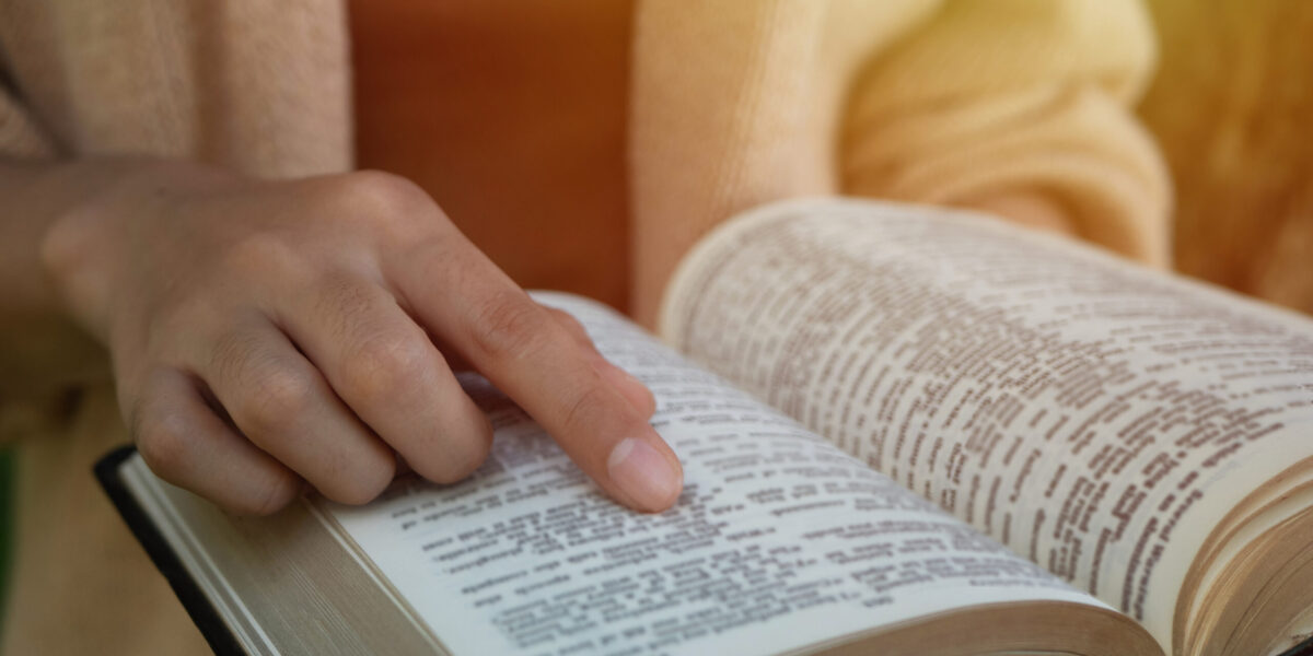 the woman sitting readings Bible a Holy Bible for faith, spirituality With the sunlight in the morning for church concept for faith,