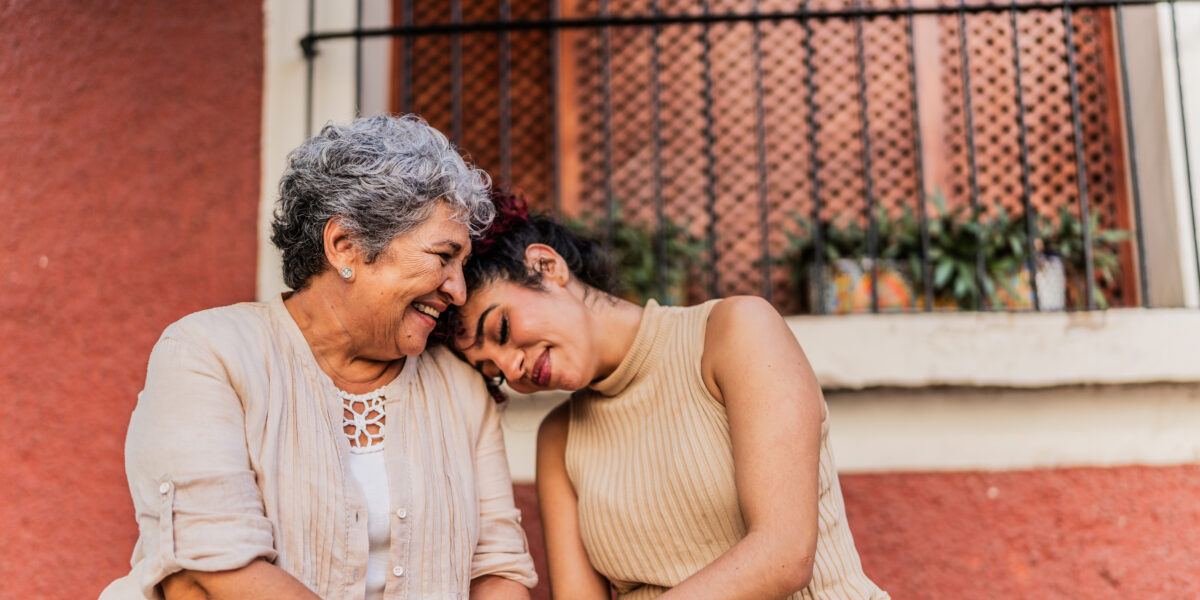 Grandmother and granddaughter together outdoors