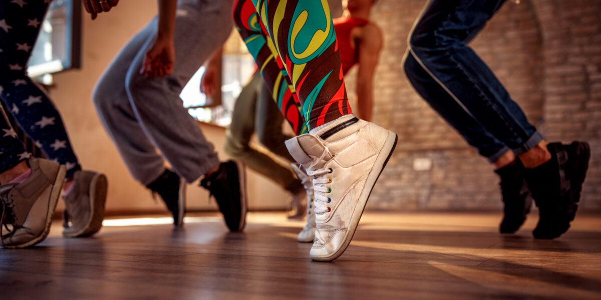 young modern dancers dancing in the studio. Sport, dancing and urban culture concept